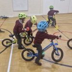 Students riding bicycles
